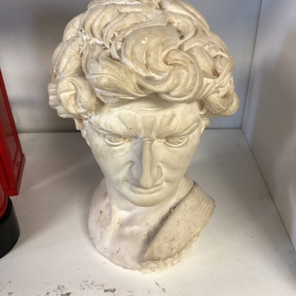 Detailed plaster Greek bust sculpture for collectors and display.