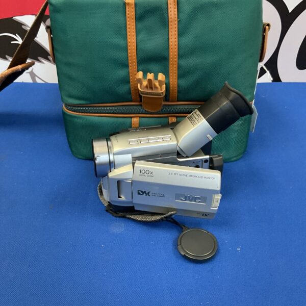 Vintage JVC Mini DV camcorder with carry case and accessories.