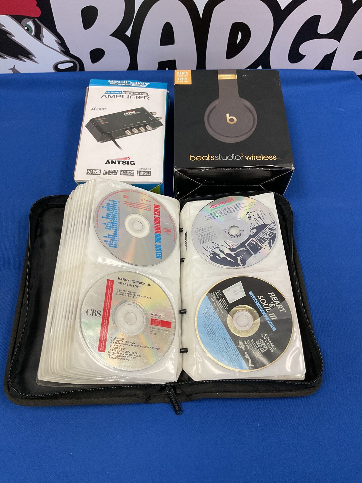 092 Beats Studio 3 wireless headphones with antsig antenna distribution amplifier and a large collection of CDs including status quo and dire straits