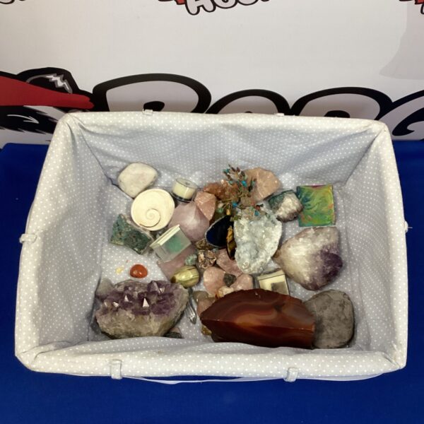Polished stone collection with colourful tumbled gemstones and mineral specimens.