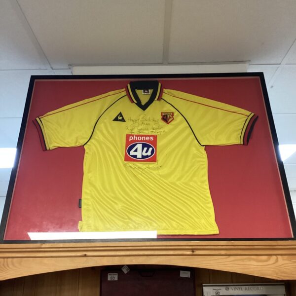 Framed signed Watford football shirt, vintage sporting memorabilia.