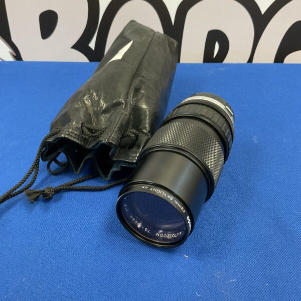 Vintage Miranda 49mm skylight filter for cameras, close-up view.