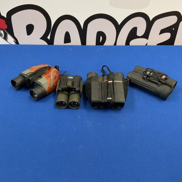 Lot of three vintage binoculars, including Pentax models.