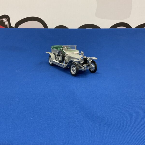 Detailed diecast model of a silver 1907 Rolls Royce Silver Ghost.