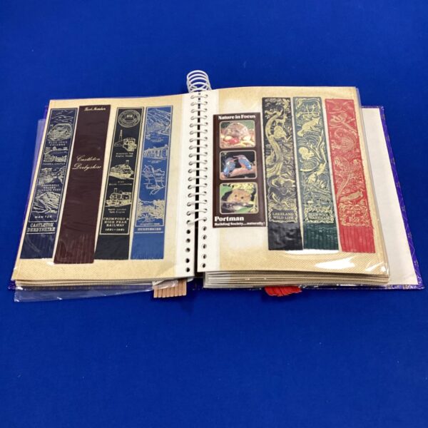Vintage bookmark album cover featuring various British locations.
