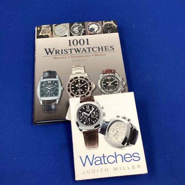 Watch reference books cover, including 1001 Wristwatches guide.
