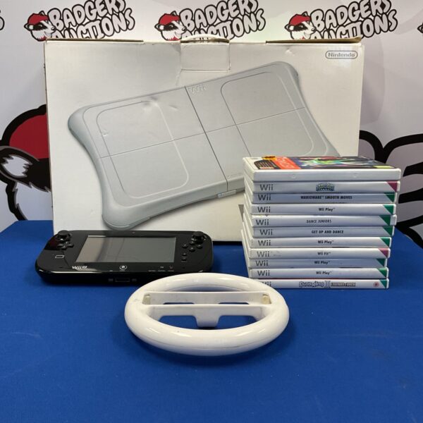 Nintendo Wii U console with balance board and accessories for sale.