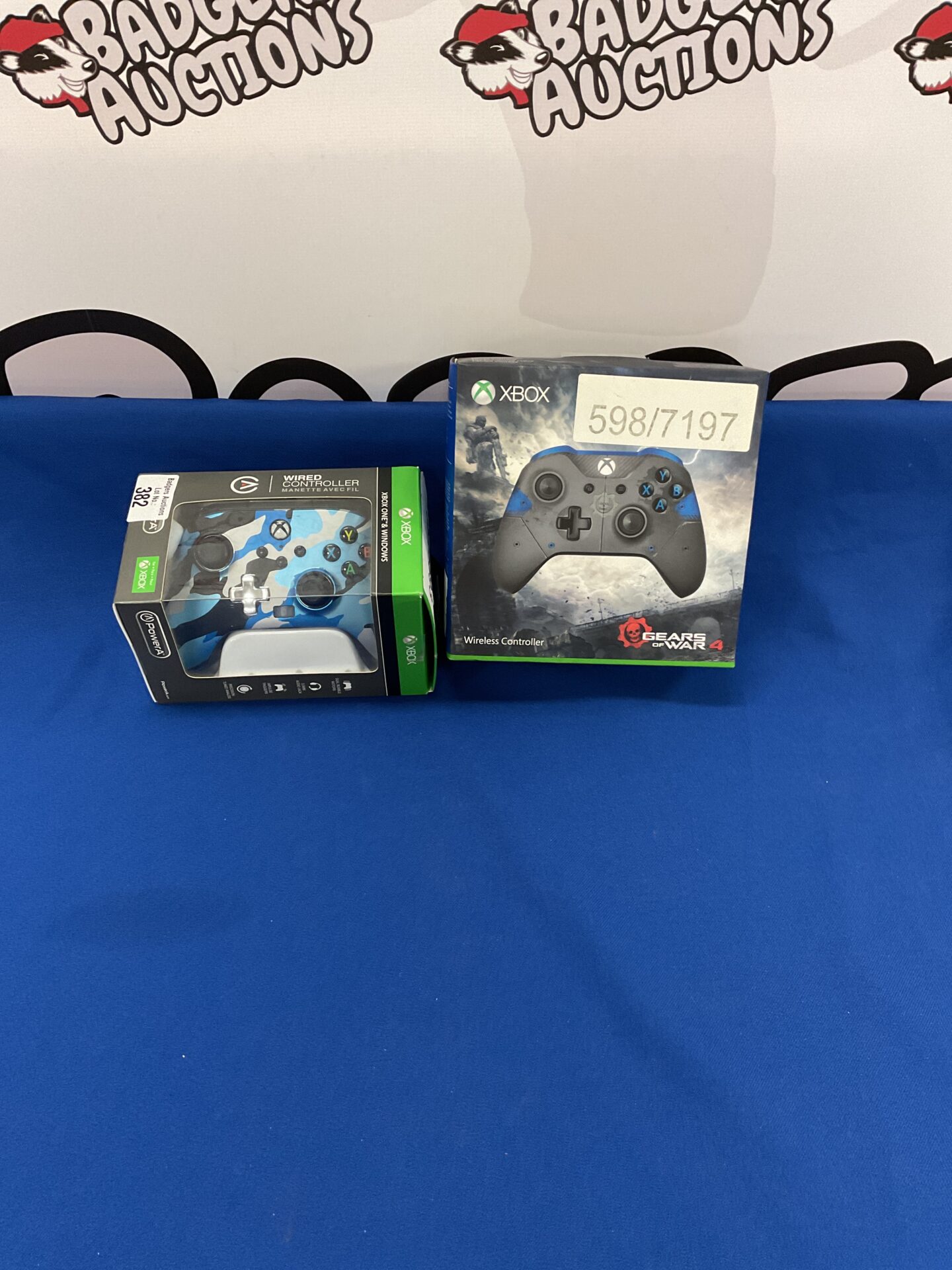 382 Two boxed x box controllers. One wired one wireless