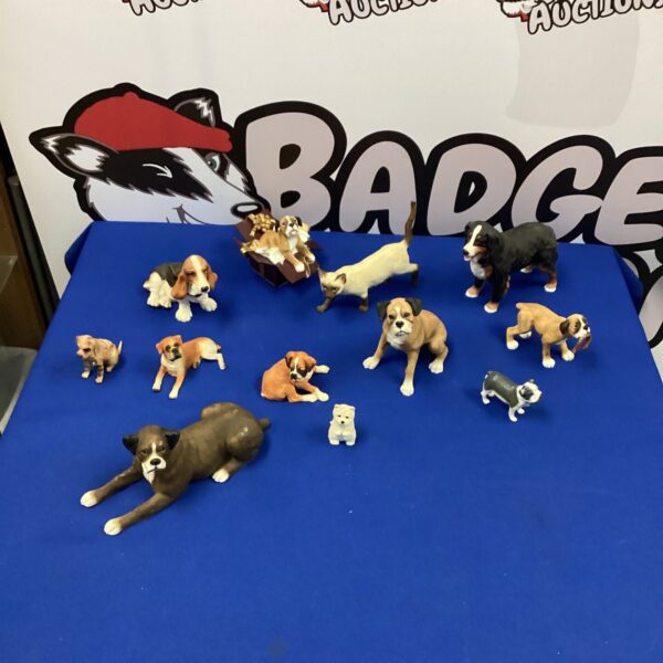 Resin dog and cat figurines lot for collectors and home decor.