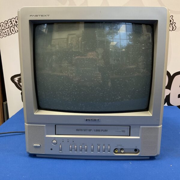 Vintage 14” CRT TV with VCR combo for retro viewing.