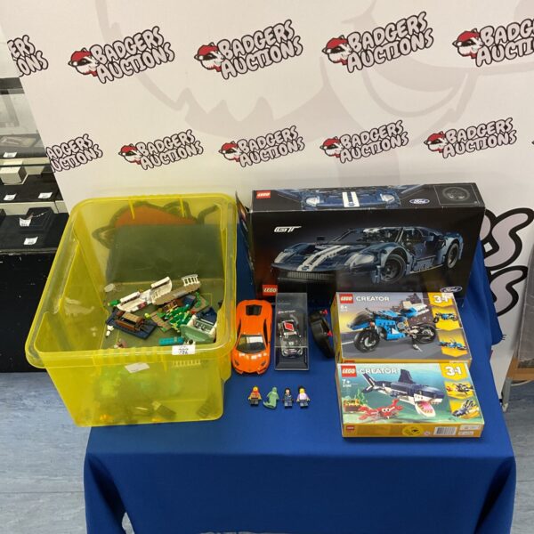 Mixed lot of Lego sets and a diecast Audi RS5 model car.