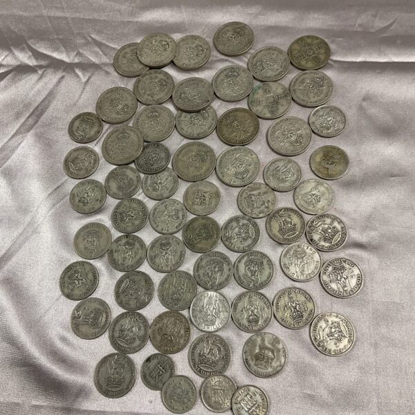 British silver half crowns from 1930-1945 in a coin lot.