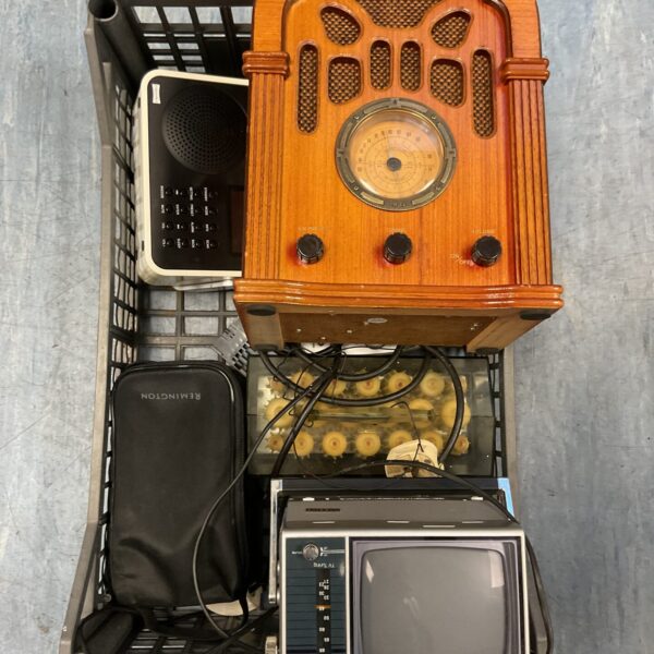 Vintage Benkson PTV5 portable television with wooden casing.