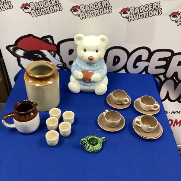 Vintage pottery lot featuring a teddy bear cookie jar.