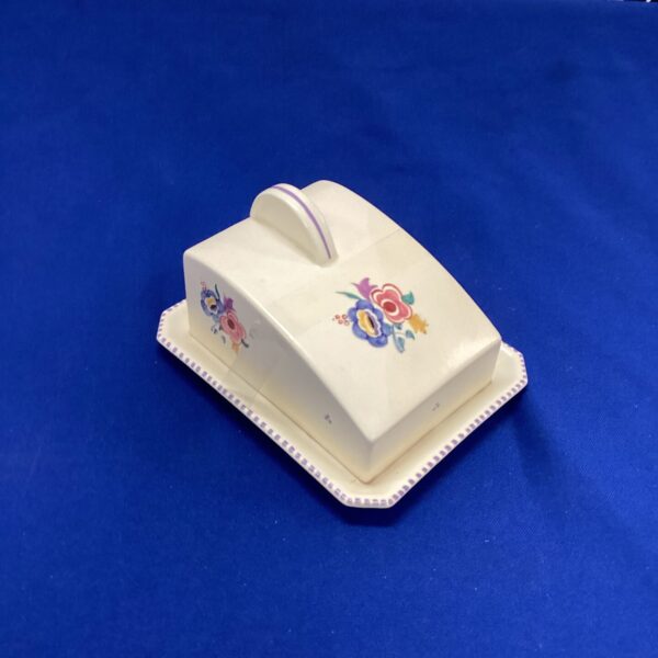 Vintage Pool Pottery cheese box with hand-painted floral design.