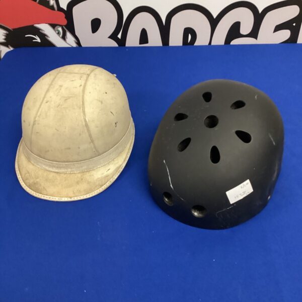 Vintage motorcycle and skateboard helmets, classic protective headwear.