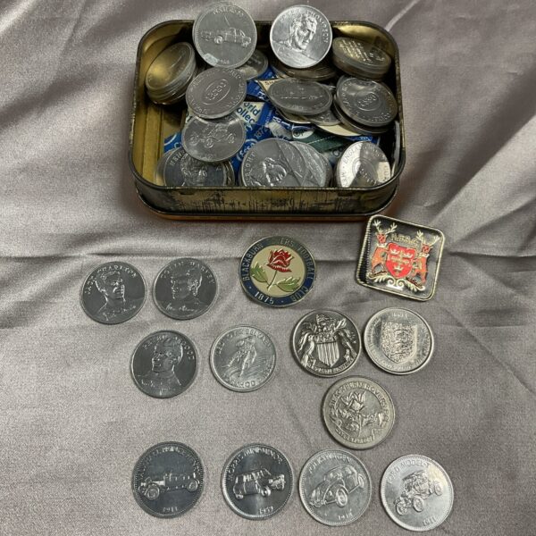 Vintage tin of Esso and Shell football and car coins.