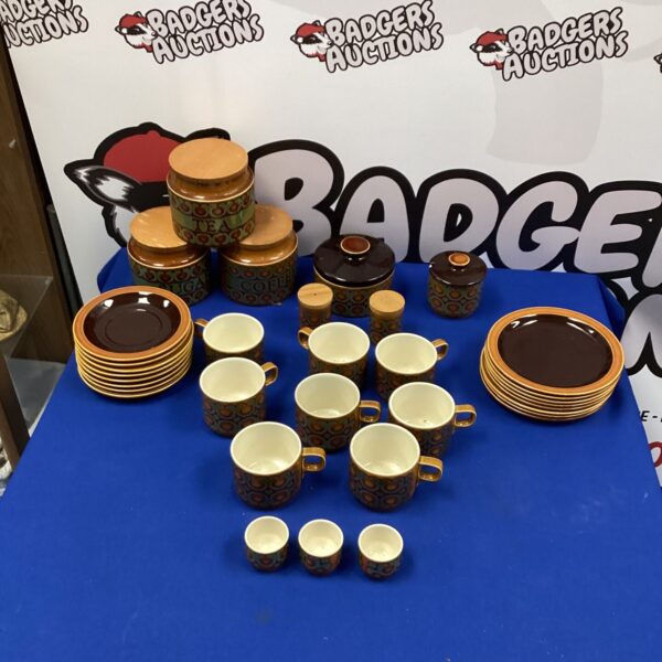 Vintage Hornsea Bronte pottery set displayed on a dark surface.