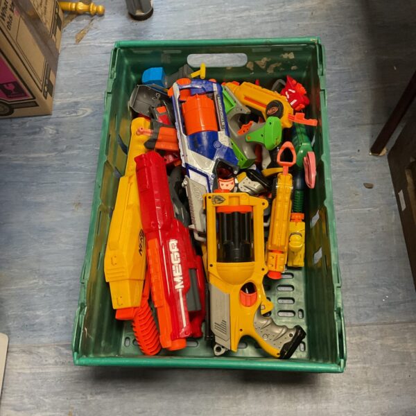 Mixed lot of Nerf guns and blasters for kids and collectors.