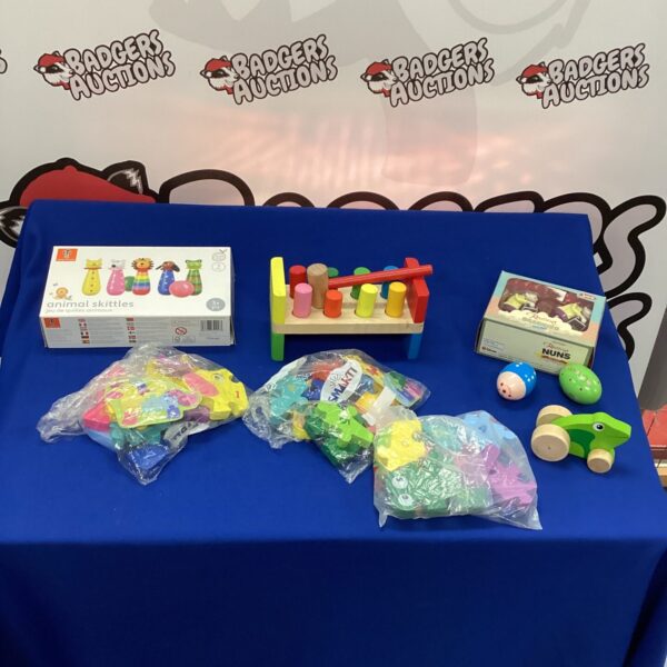 Colourful lot of pre-owned wooden childrens toys for early learning.