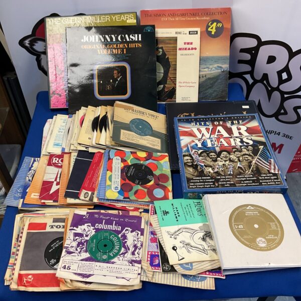 Mixed lot of vintage vinyl records including Simon and Garfunkel.