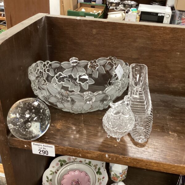 Vintage glass serving bowl with floral design, ideal for display.