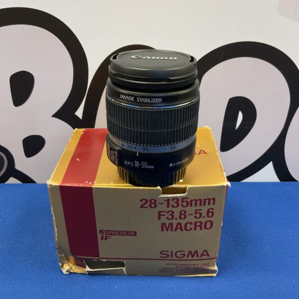 Sigma 28-135mm lens, a versatile interchangeable camera lens.
