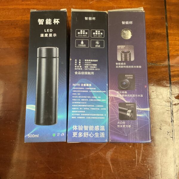 Stainless steel thermal flask with digital temperature display for hot or cold drinks.