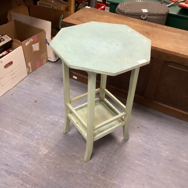 Vintage octagonal occasional table with painted finish.