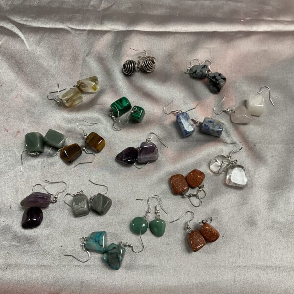 Lot of sixteen pairs of crystal and stone earrings.