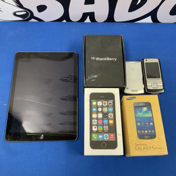 Mixed lot of vintage mobile phones including Apple, Blackberry, and Samsung.