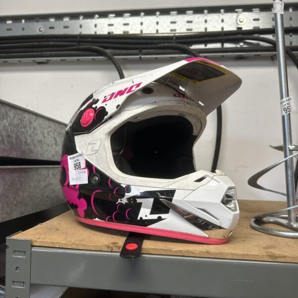 Pink and white motocross helmet sized 49-50cm for off-road racing.