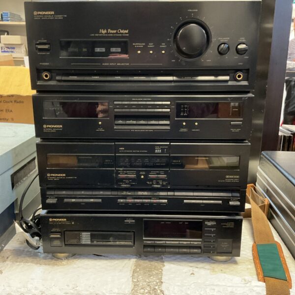 Vintage Pioneer HiFi stack system with CD changer and cassette deck.