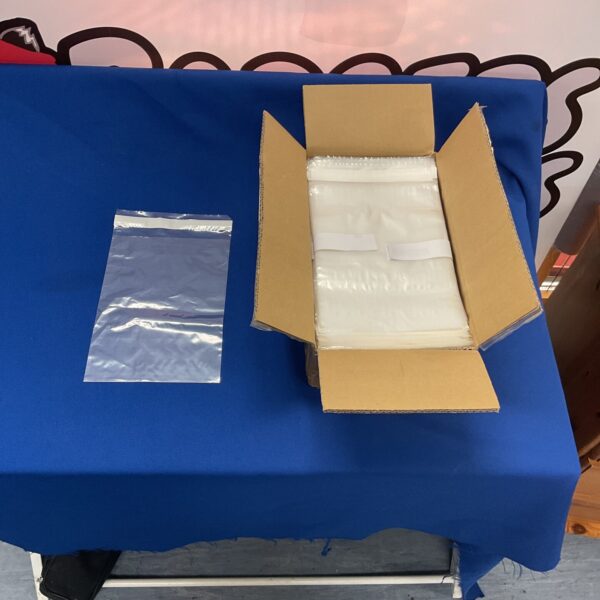 Lot of clear C5 plastic bags for mailing and packaging.