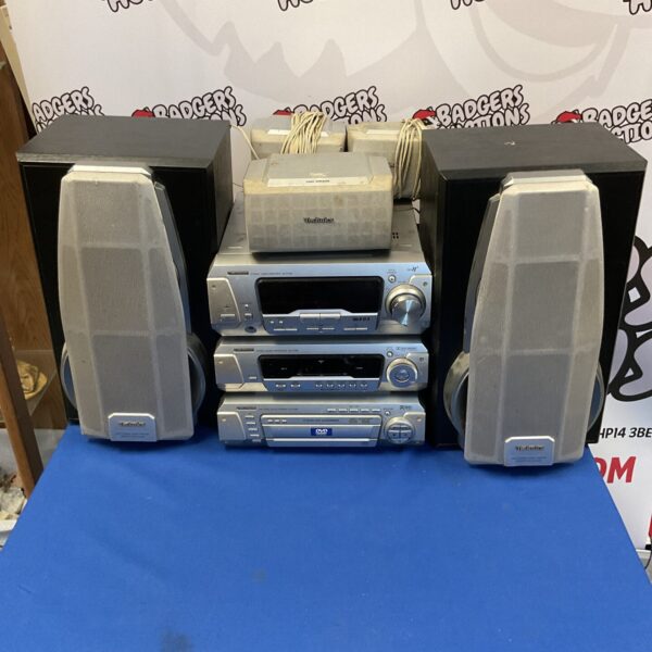 Technics hi-fi system stack including amplifier and DVD changer.