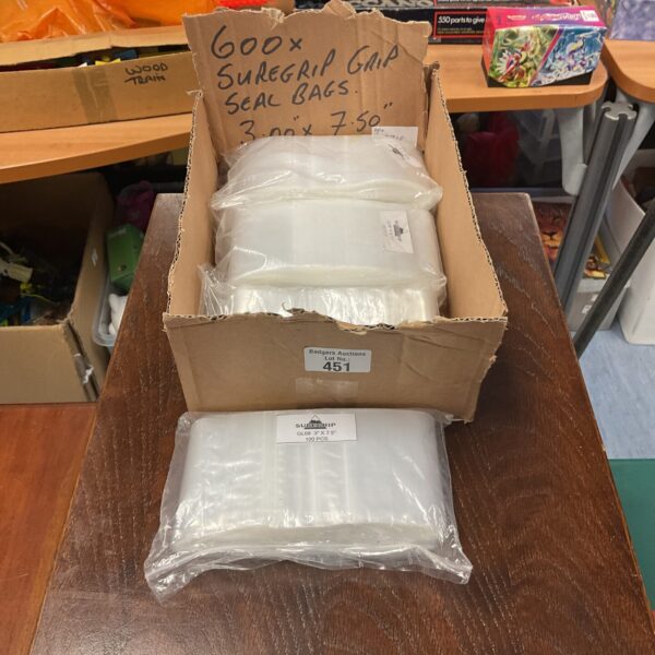 Bulk lot of 600 clear grip seal bags for storage and packaging.