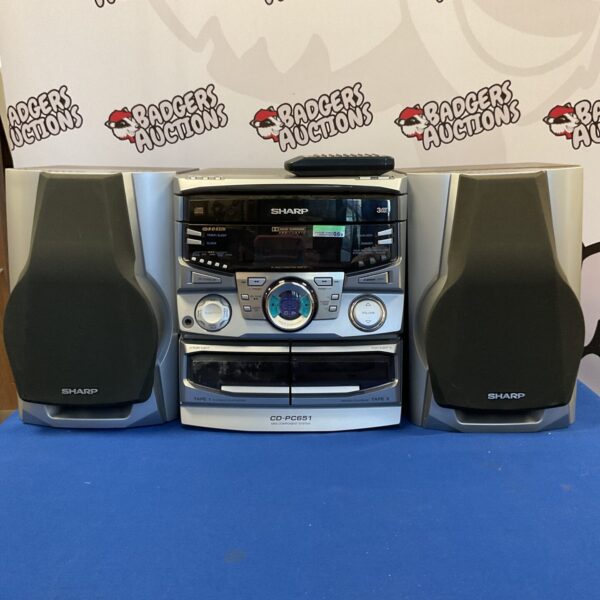 Vintage Sharp CD-PC651 mini hifi system with CD player and speakers.