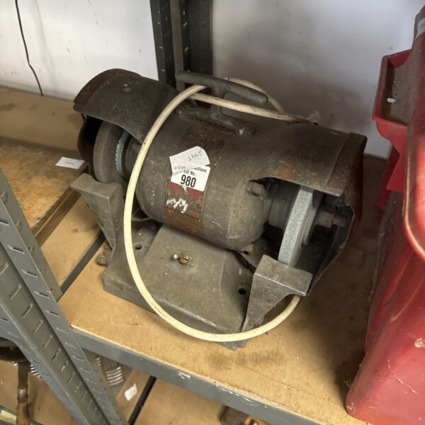 Vintage 6 inch bench grinder, workshop tool for metalworking.