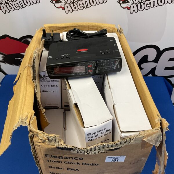 New job lot of vintage hotel radio alarm clocks in boxes.
