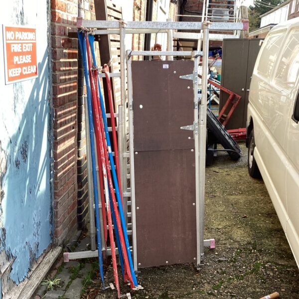 Aluminium scaffolding tower with platform for work at height.