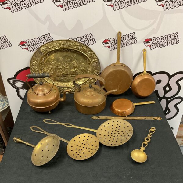 Vintage copper and brass kitchenware lot with kettles and pans.
