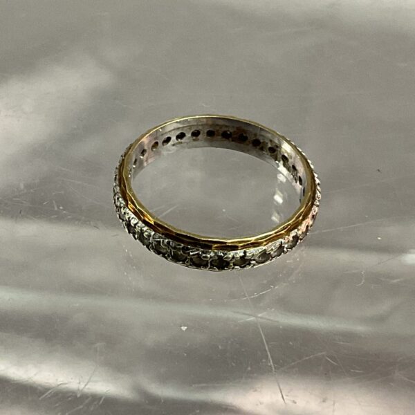 Close-up of a 9ct gold stone set ring, size M.
