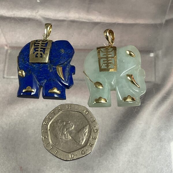 Vintage 14ct gold mounted jade and lapis lazuli elephant pendants.