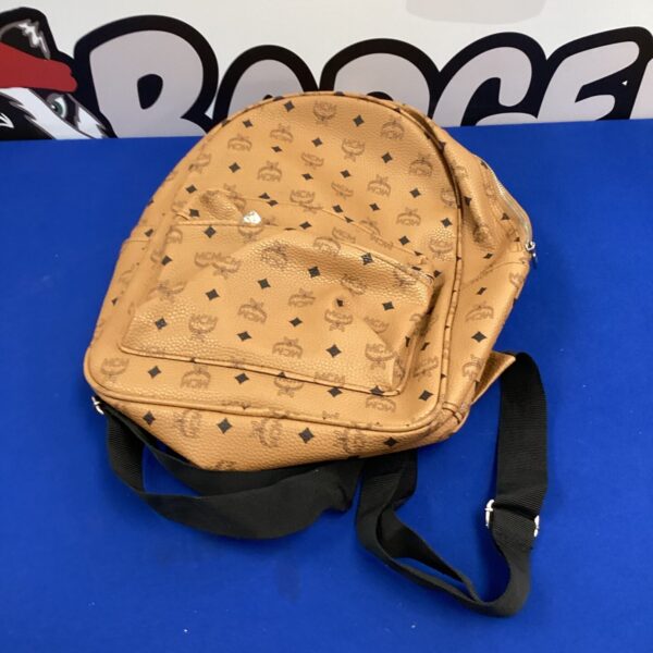 Front view of vintage MGM style patterned rucksack.