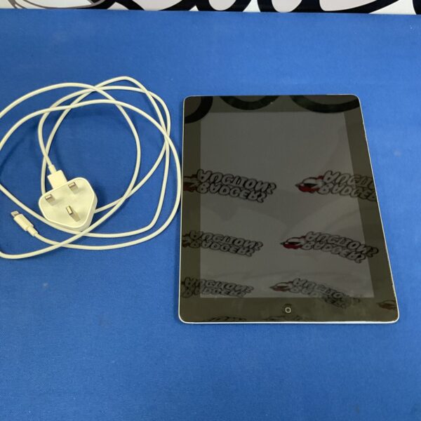 Apple iPad tablet with charger, showing the device and its accessories.