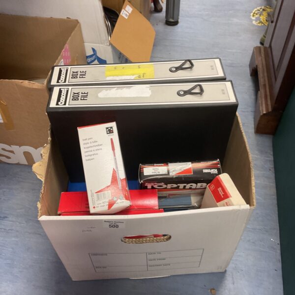Office supply lot with box files and pens for storage.