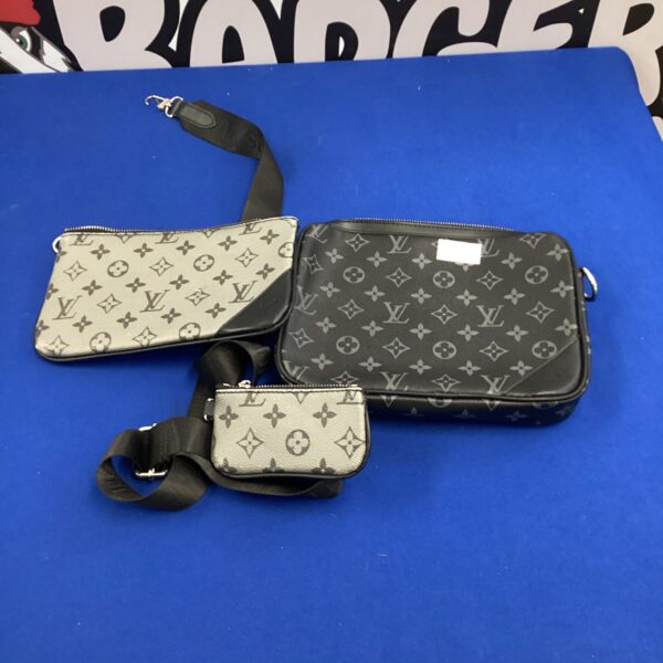 Louis Vuitton style crossbody bag with coordinating purses.