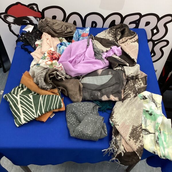 Mixed lot of colourful patterned scarves for fashion accessories.