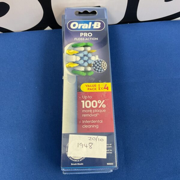 Four Oral B Pro Floss Action electric toothbrush heads in original packaging.