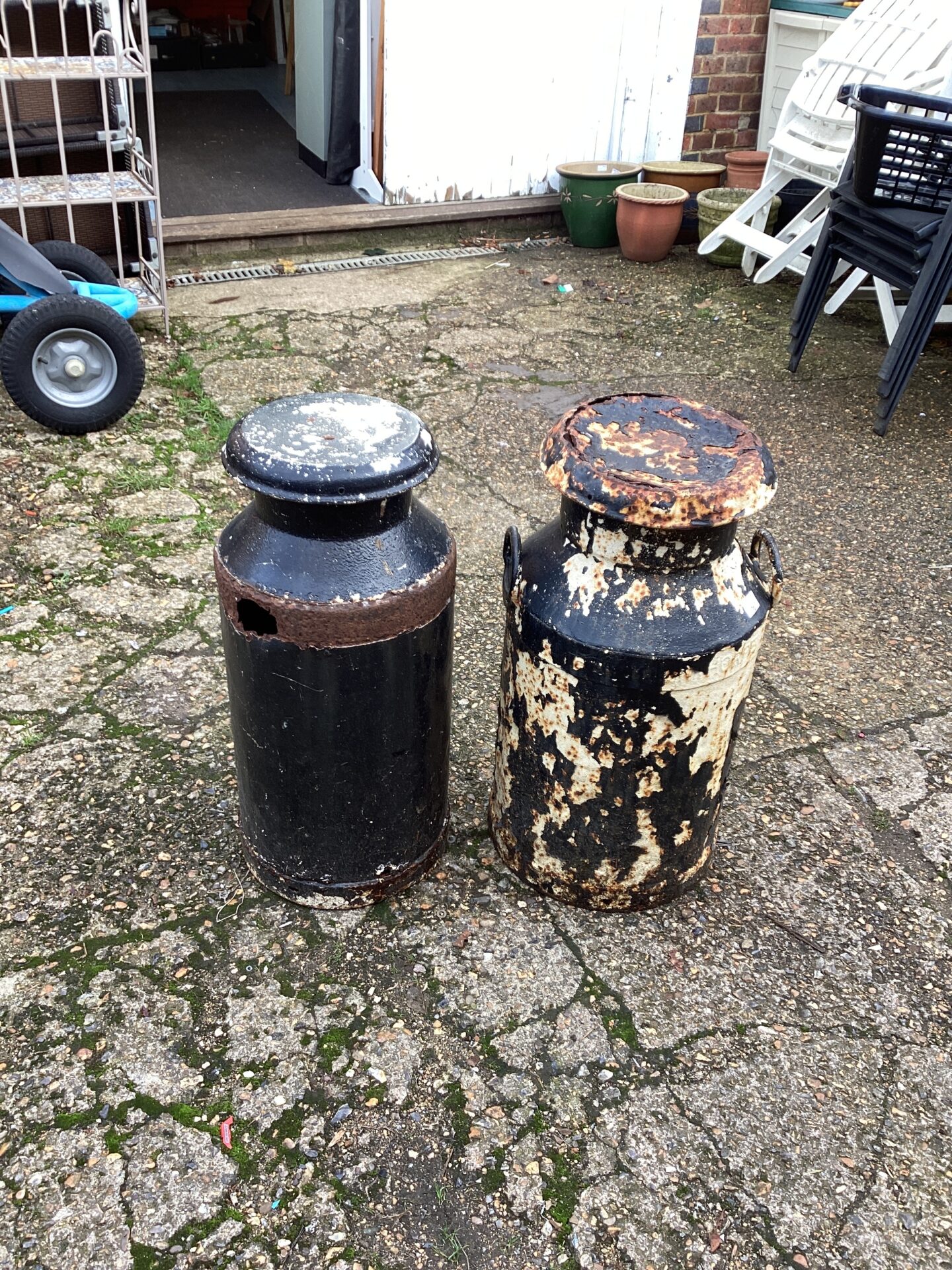 1167 Two antique Milk Churns